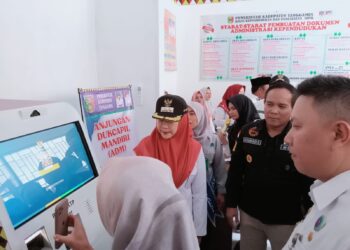 Bupati Tanggamus Hadiri Launching Anjungan Dukcapil Mandiri