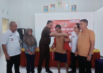Kejaksaan Negeri Tanggamus Melaksanakan Pelepasan Terhadap Penghentian Penuntutan Berdasarkan Keadilan Restorative Justice